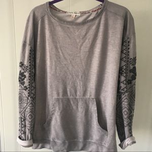 Purple, gently worn tunic sweater.
